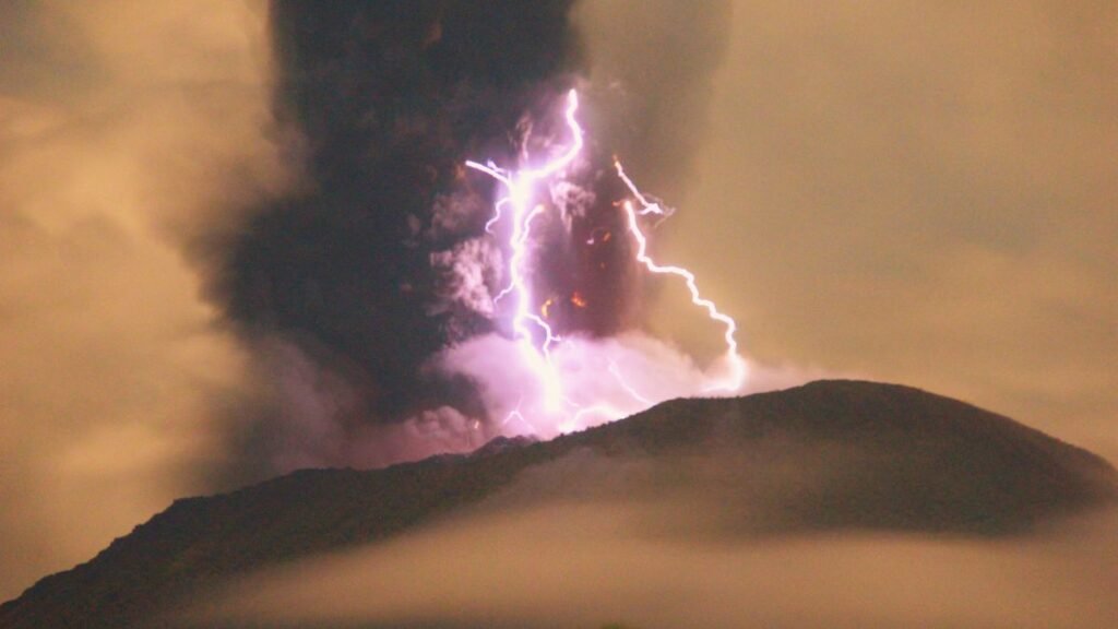 Mount Ibu Erupts Dramatically with Purple Lightning, Forcing Evacuations in Indonesia