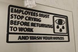 Employee Fired for ‘Stop Crying’ Sticker in Office Bathroom, Claims HR Approval